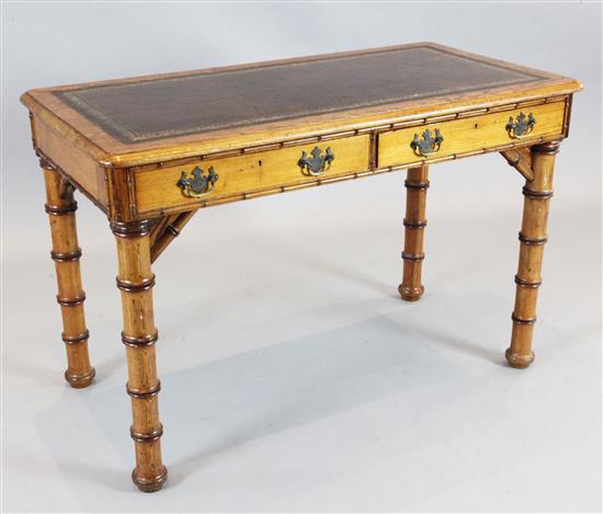 Howard & Sons. A Victorian pine writing table, W.3ft 6in. D.1ft 10in. H.2ft 3in.